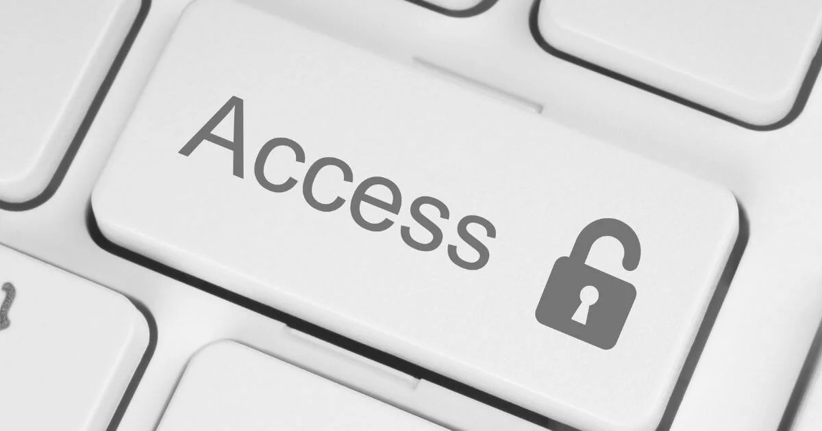 Close-up of an “Access” key with an unlocked padlock icon, representing an accessibility-first approach to inclusive education.